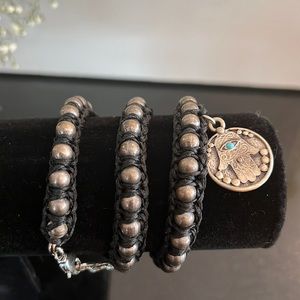Black beaded wrap bracelet with Hamsa